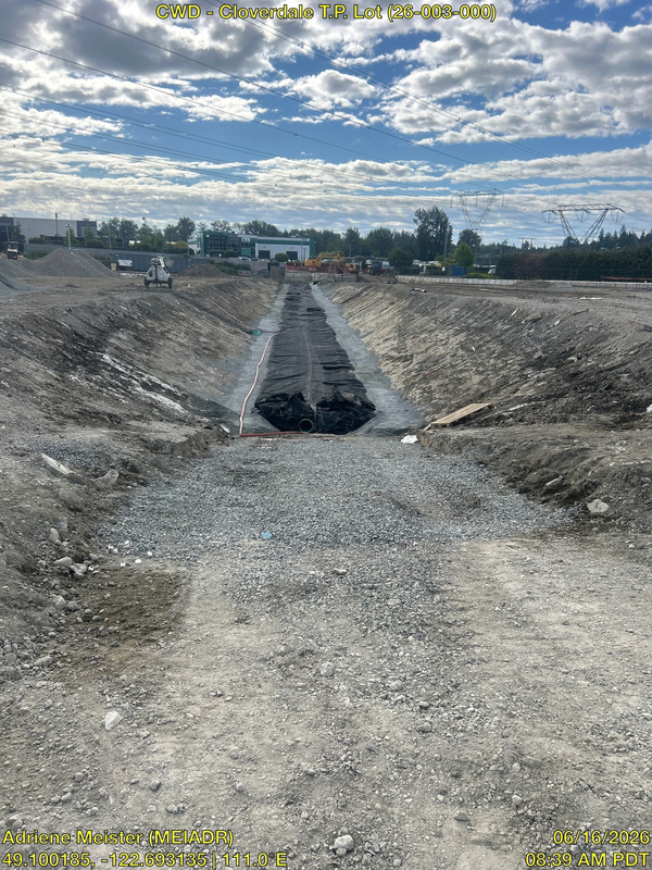 Protective nonwoven geotextile armor wrap over sealed detention tank